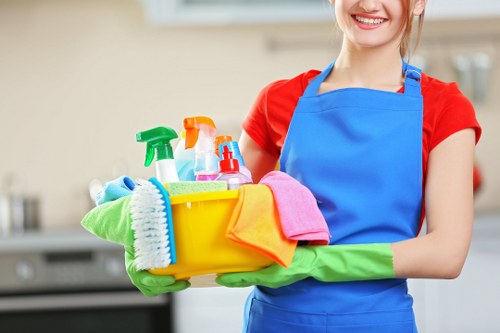 Cleaning technician preparing carpet cleaning equipment at a property